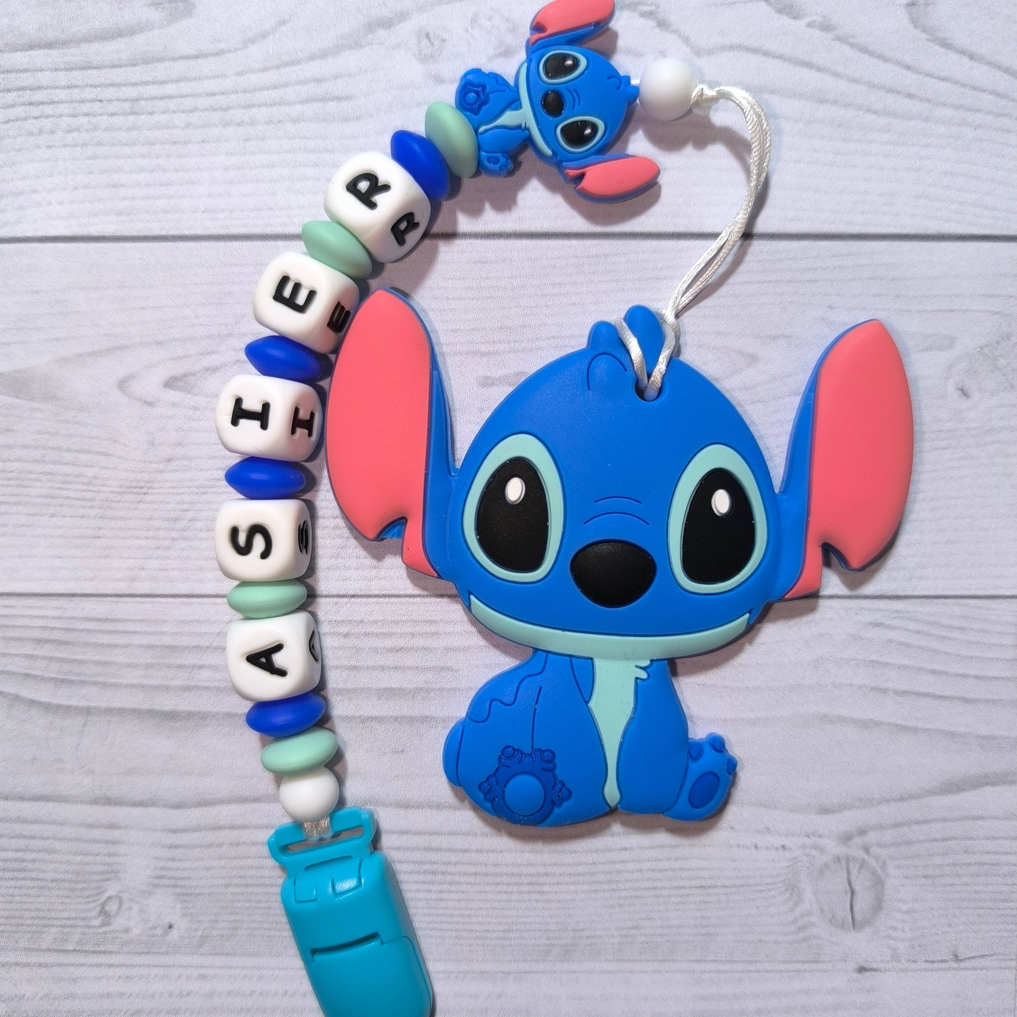 Chupetero + mordedor de Stitch con nombre.